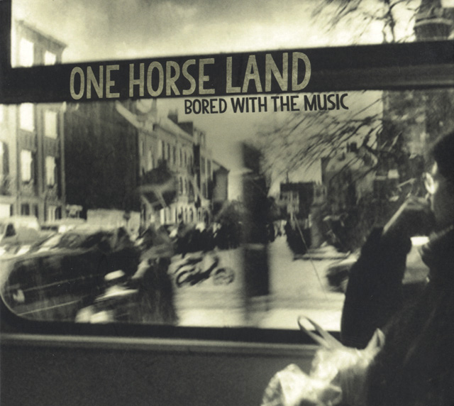 Bestand:OneHorseLandBoredwiththemusicCDscan - 0040551.jpg